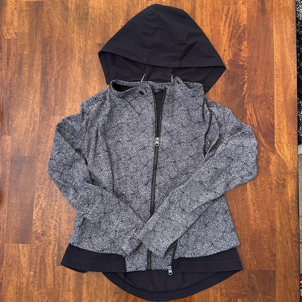 Lululemon jacket with peplum detail and double zip closure. Size 6 or 8